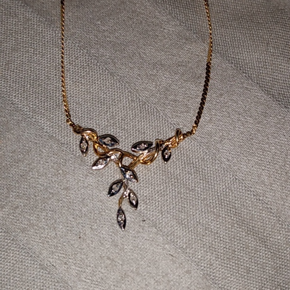 Vintage 14k 9 white gold leaves with diamond accents